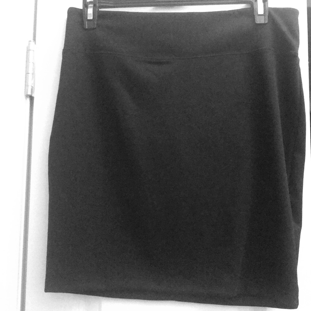 Black stretchy skirt with gold exposed zipper